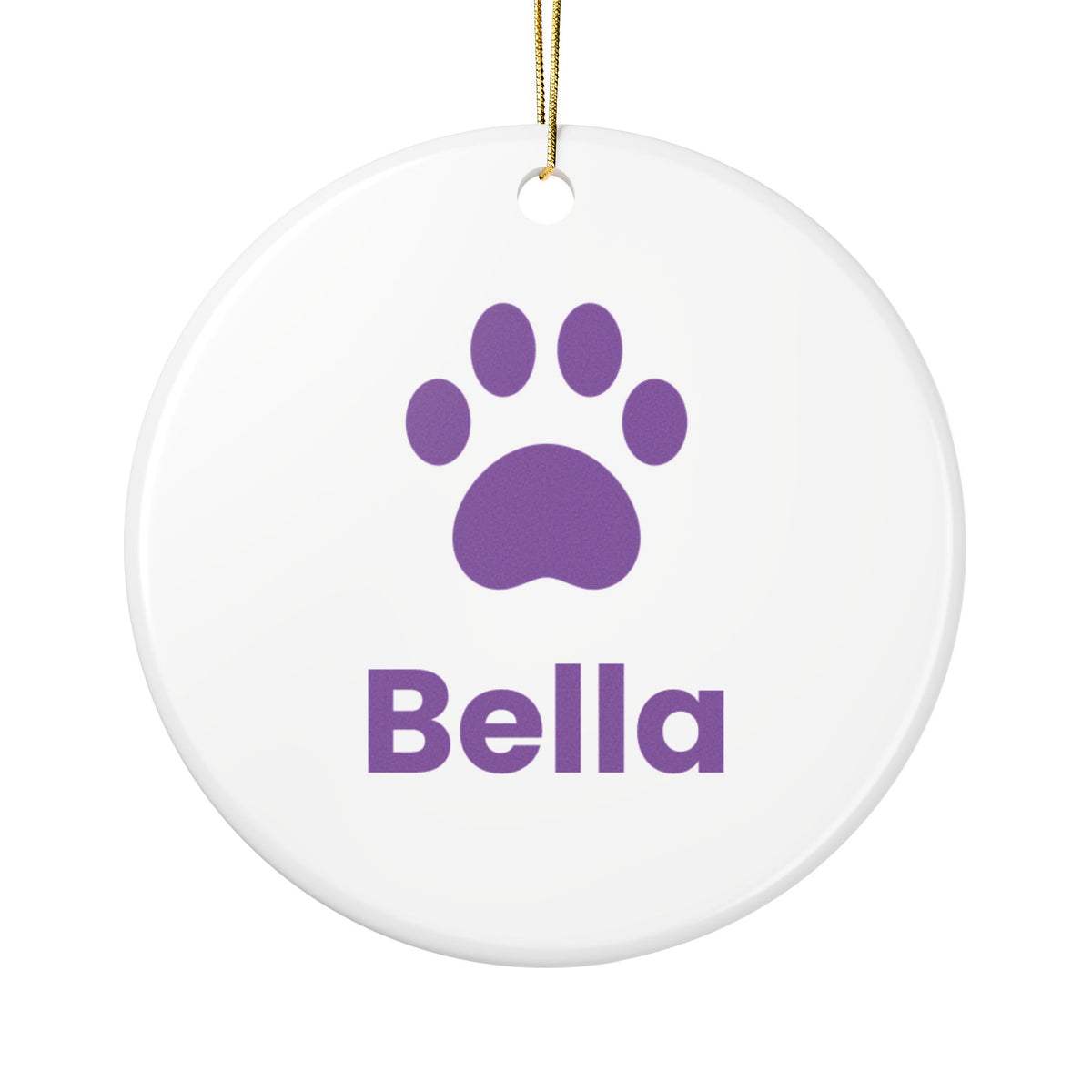 Round white ceramic dog ornament with a purple paw print and the name Bella